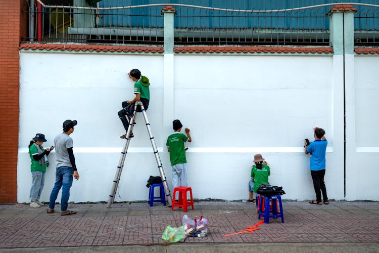 Group Of Artists On Street