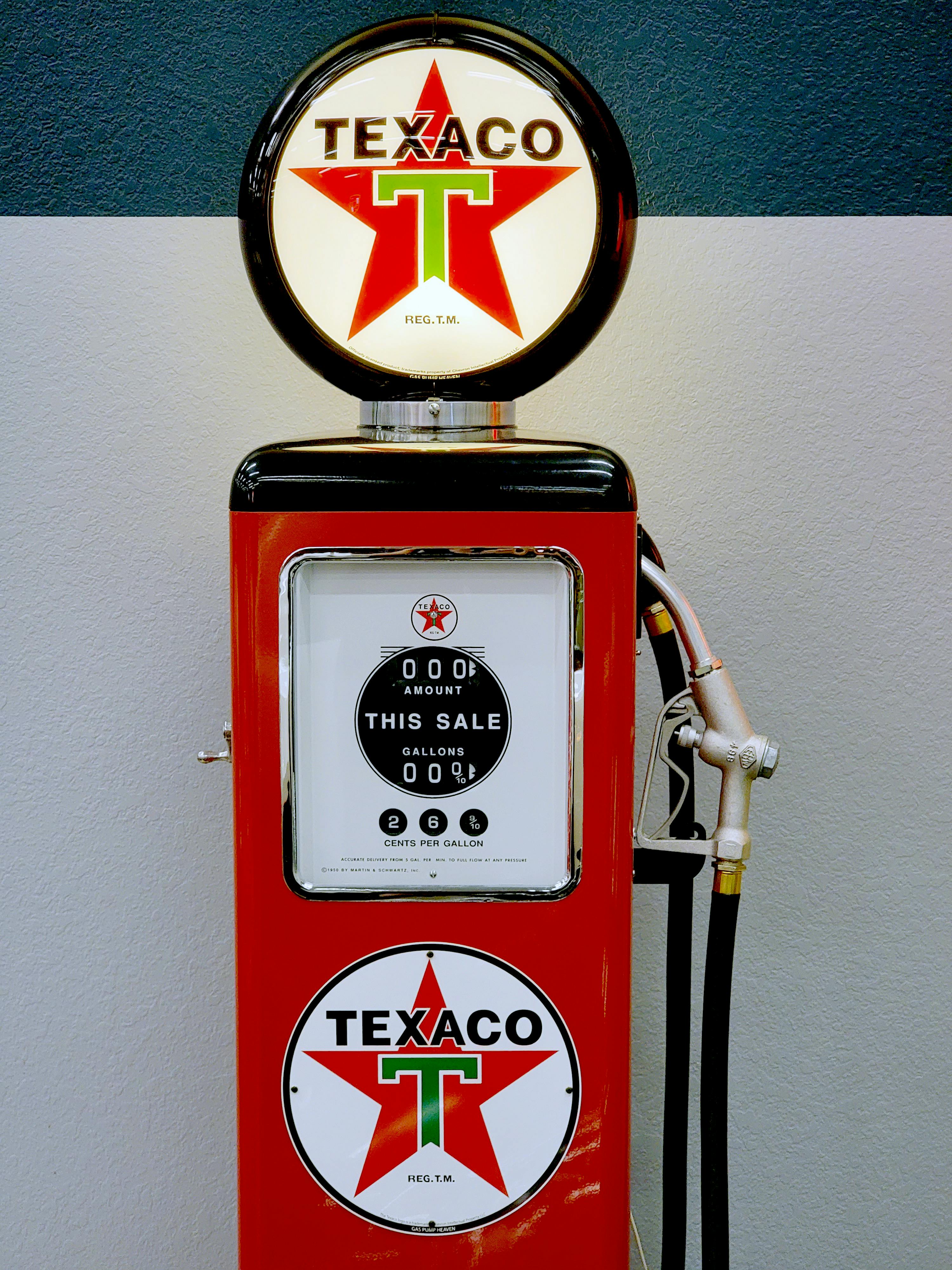 a vintage texaco gas pump in close up photography