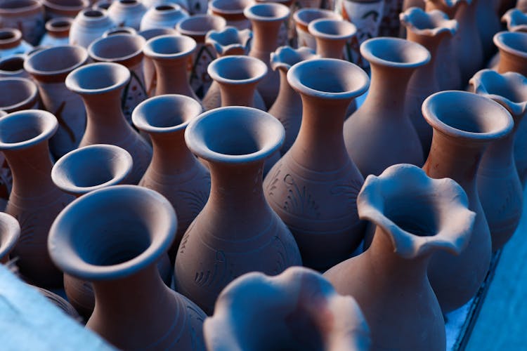 Assorted Clay Vases Lined Up