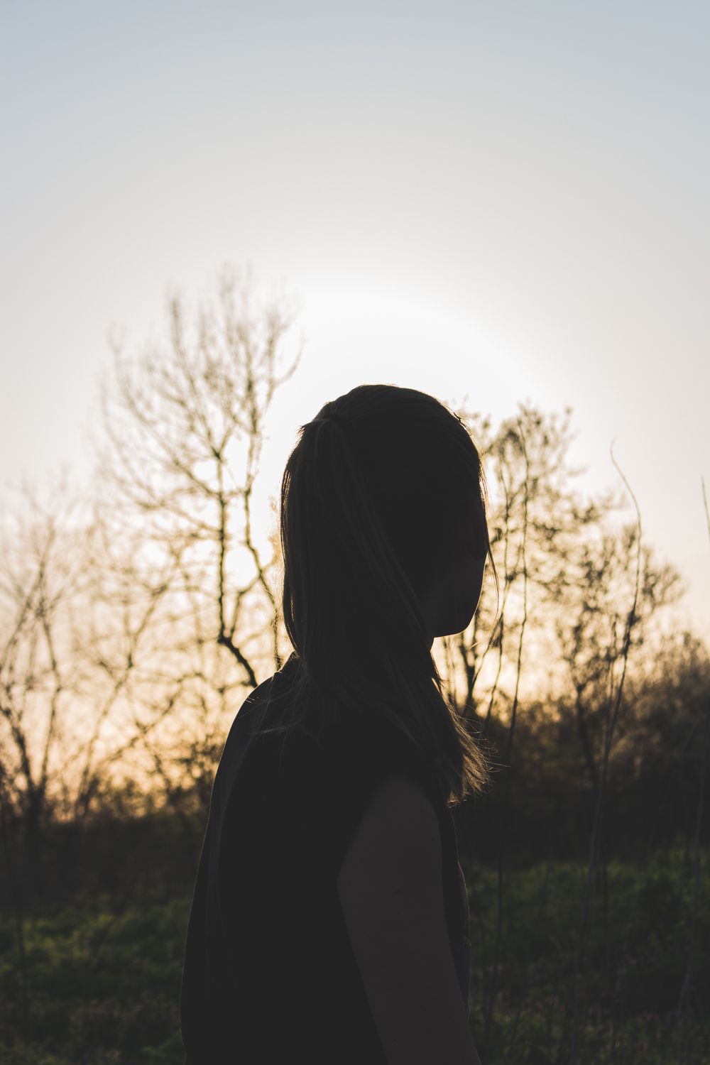 Silhouette of Woman during Sunset · Free Stock Photo