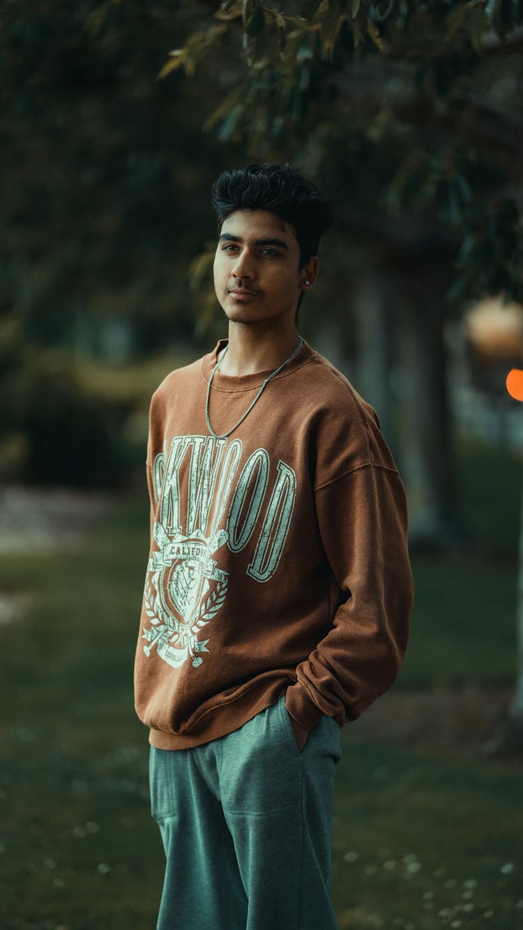 Man In Brown Sweater