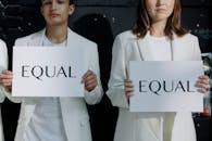 Man in White Dress Shirt Holding White Box