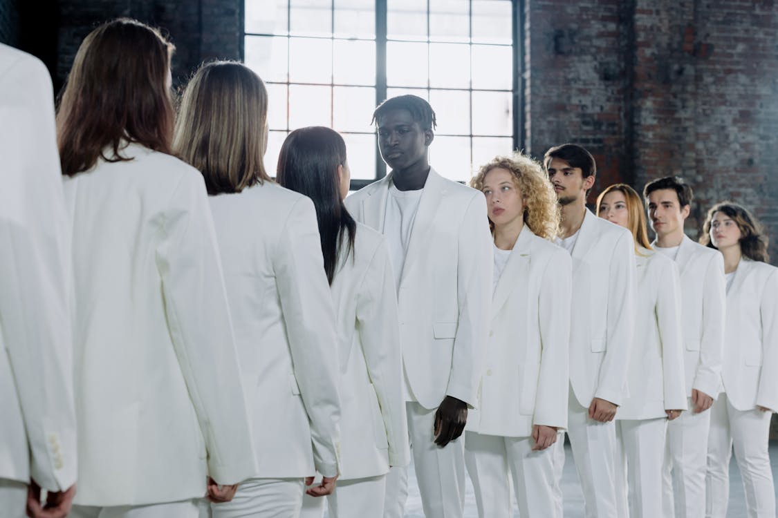 People Wearing White Suits