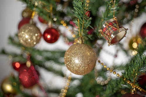 Free Christmas Decors Hanging on a Christmas Tree Stock Photo