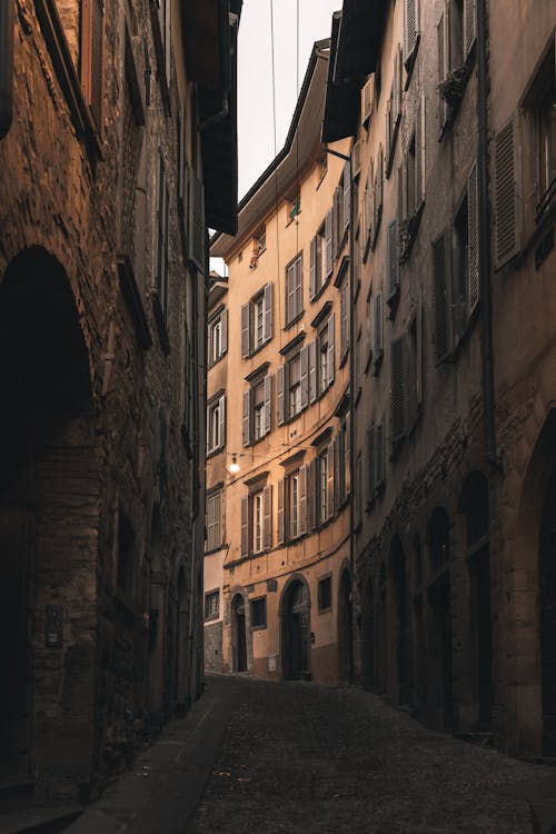 Narrow Alley Between Two Old Buildings