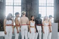 A Group of People with Red Line on their Body