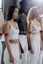 A Group of People in White Pants