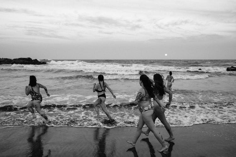 Women Running Into The Sea 