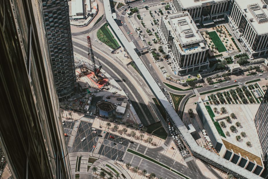 Unforgettable 12 Minute Helicopter Ride in Dubai with Optional Transfer Review Review 2026 - Overhead capture of Dubai's bustling downtown showcasing roads and modern buildings.