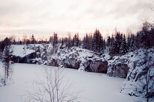 Free Snow-covered Marble Canyon in Republic of Karelia during winter sunset. Stock Photo