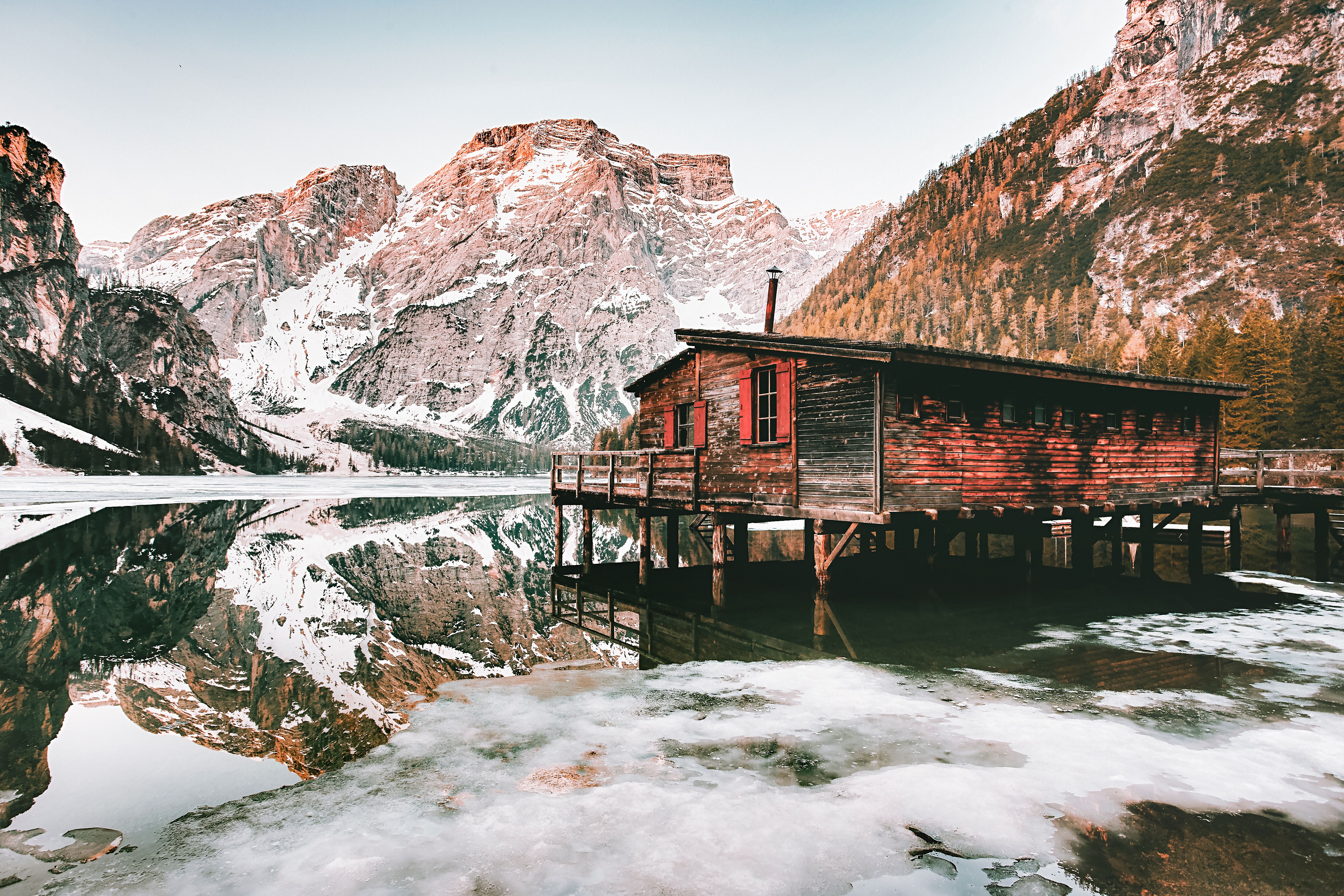 Lakeside House Against Mountain · Free Stock Photo