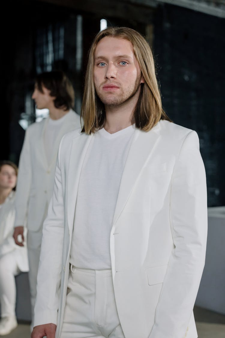 Man Wearing White Blazer And Pants