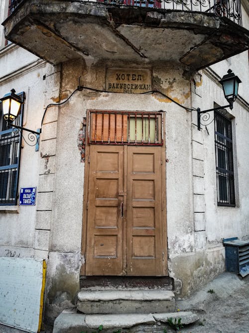 A Wooden Door on a Concrete Building