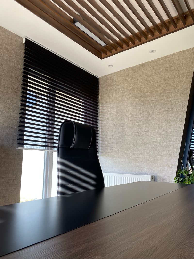Graphite zebra blind in a room