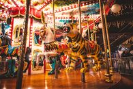 Brown and Red Carousel With People
