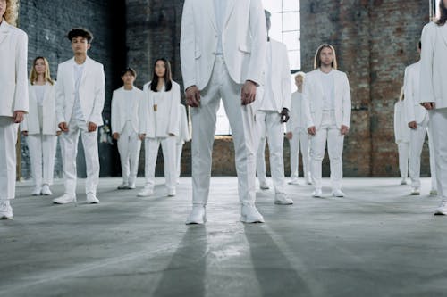 Group of People in White Clothes 