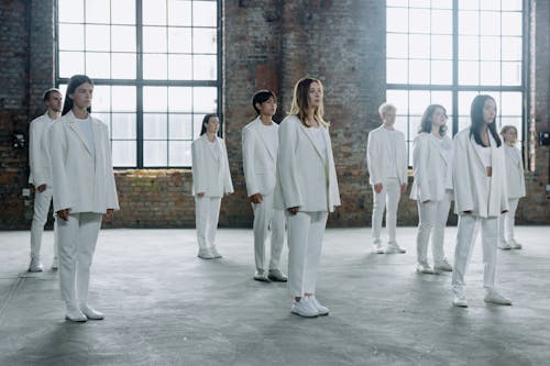 A Group of People Wearing All White Outfits 