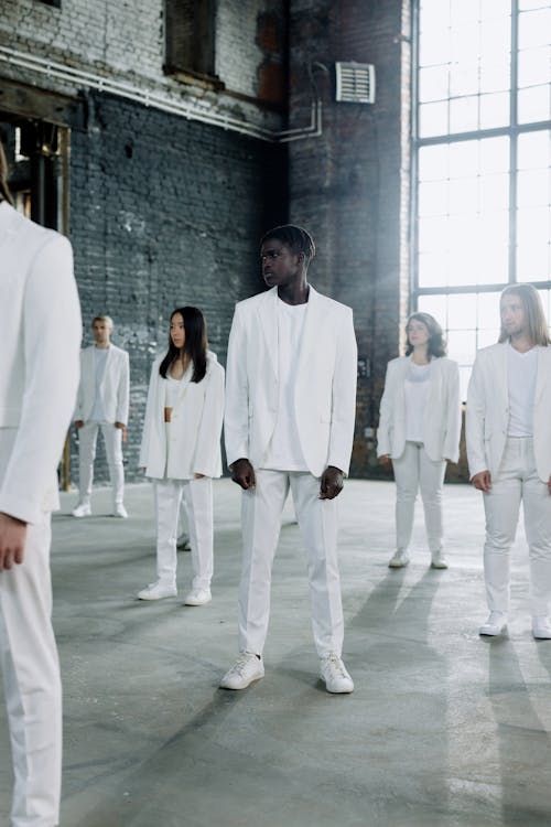 Group of People in White Clothes
