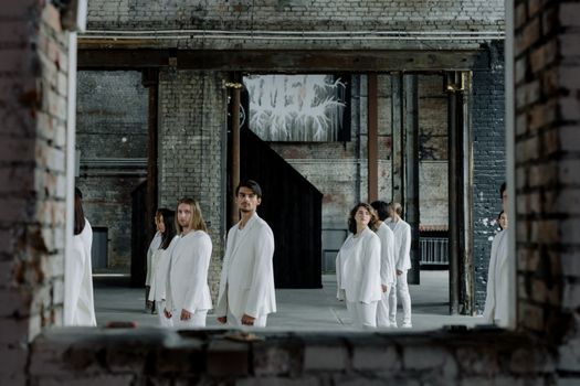 Group of People in White Clothes