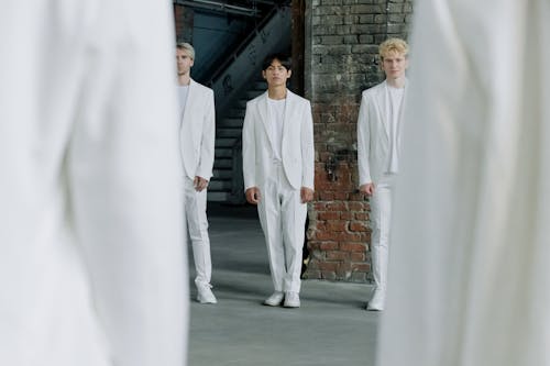 Group of People in White Clothes 