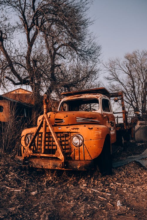 Free Abandoned Vintage Truck in Rural Landscape Stock Photo