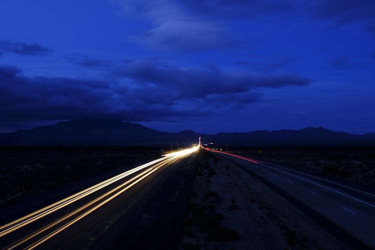 Highway Under Dawn Sky