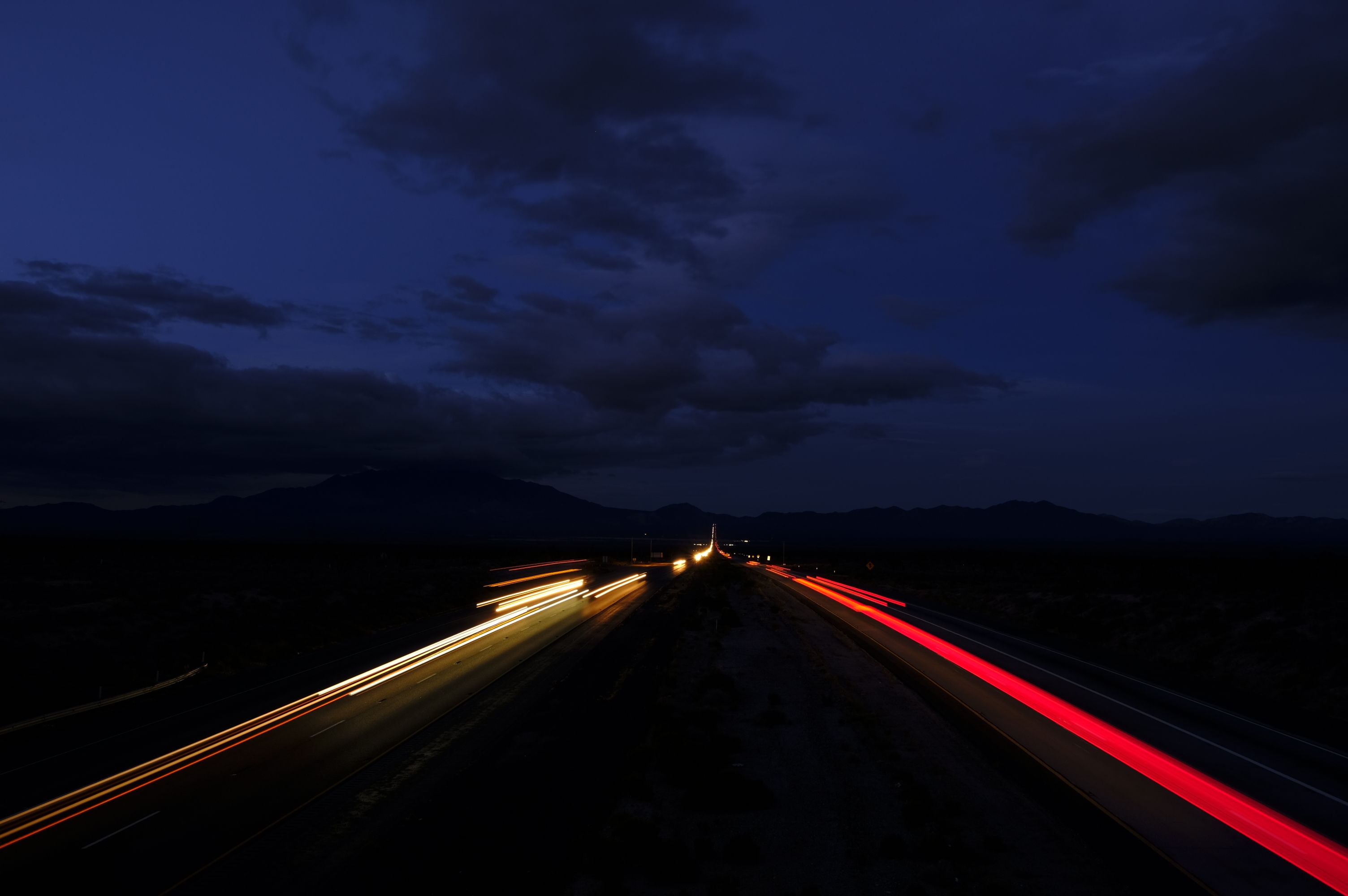Dynamic long exposure view of car lights on a dark highway, capturing motion and perspective.. pexels, dynamic, long