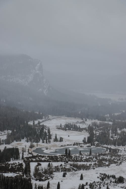 Aerial Footage of Mountain View covered in Fog 