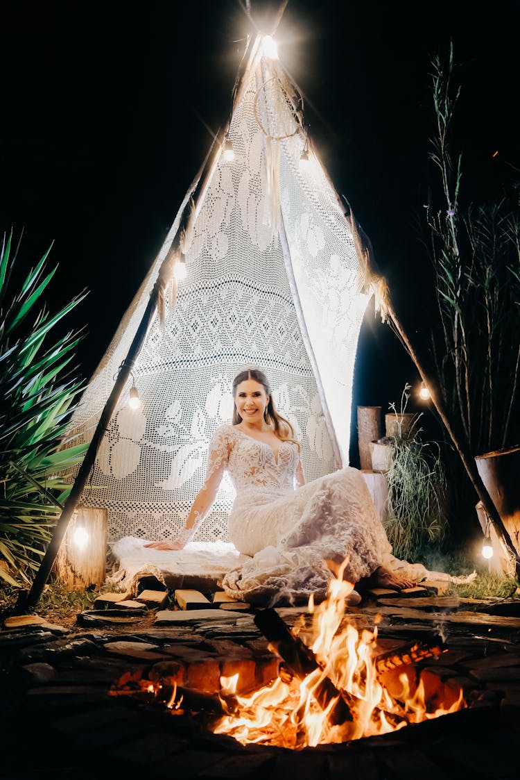 Woman Sitting In Tipi Tent