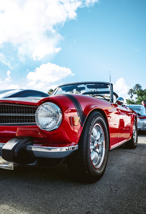 A Red Car Parked on the Road