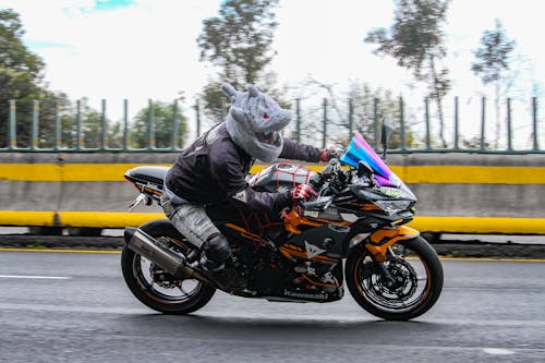 A Person Riding a Kawasaki Motorcycle