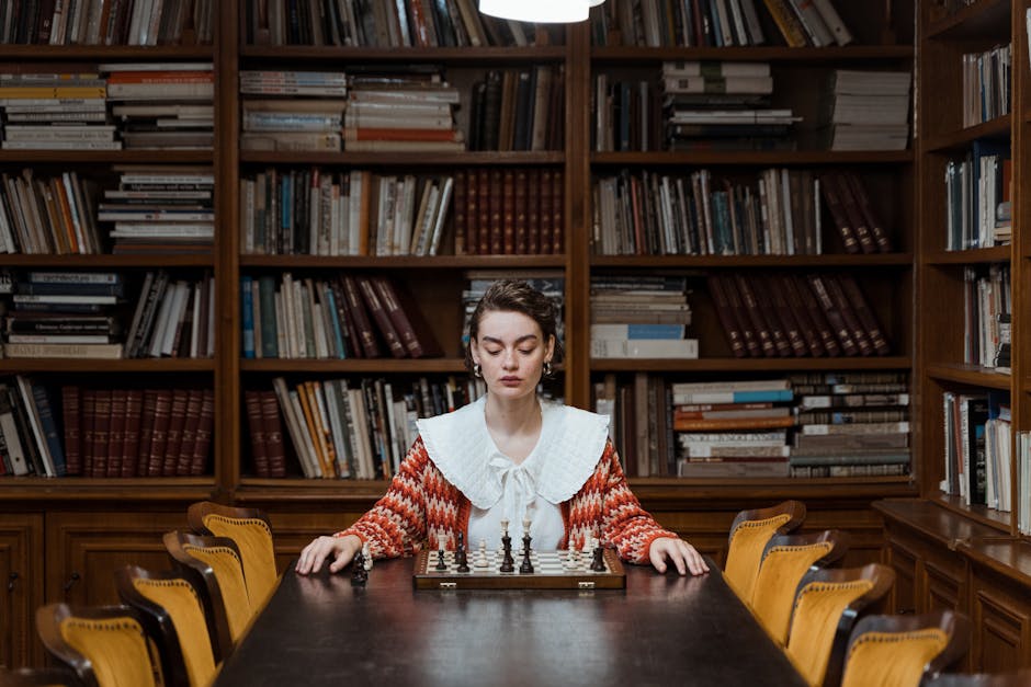 Books and a person contemplating - best books on overcoming self doubt
