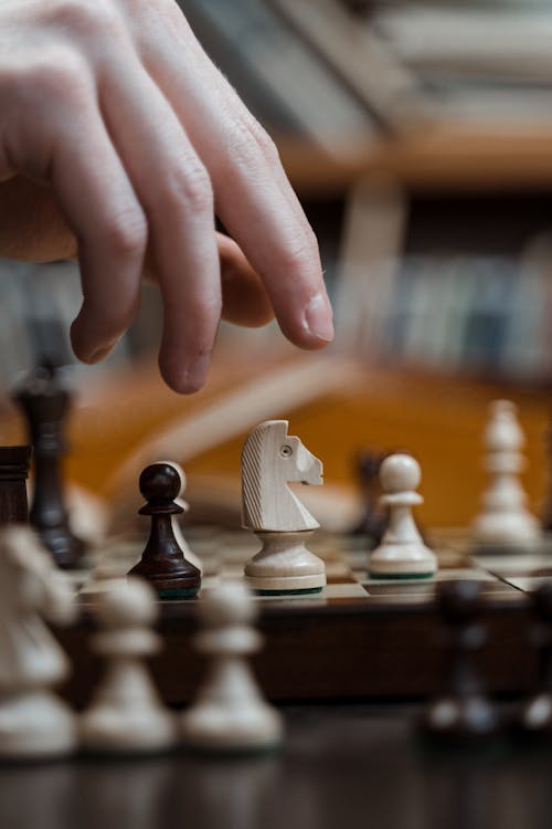 A Wooden Chess Pieces on Board