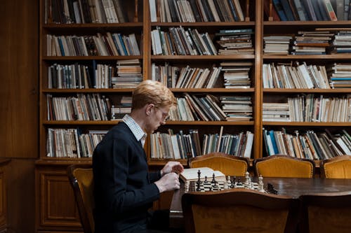 Free Pensive Man playing Chess  Stock Photo