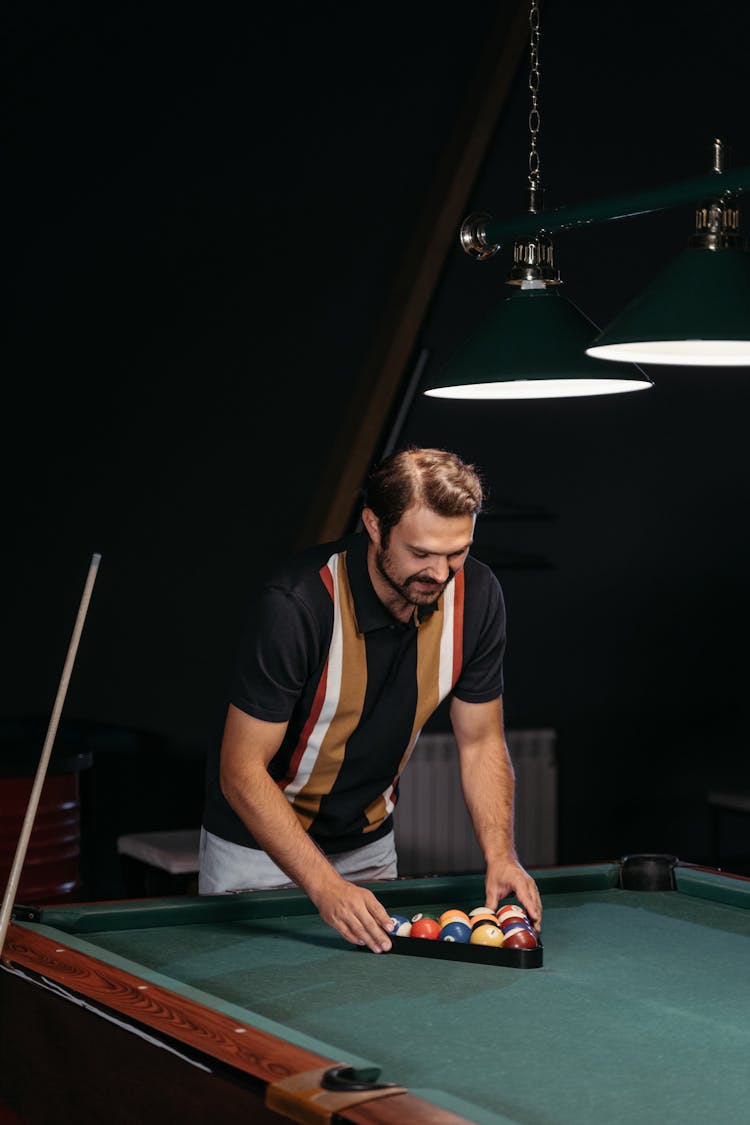 A Man Playing Billiard