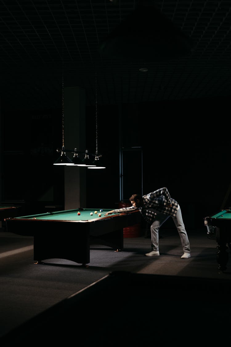 Person Playing Billiards