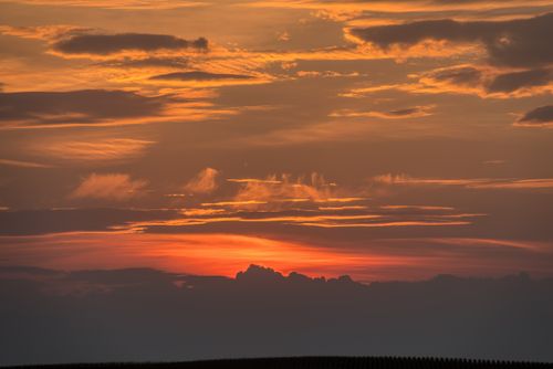 Free Captivating sunset with vivid sky and dramatic clouds over a horizon in Minnesota, USA. Stock Photo