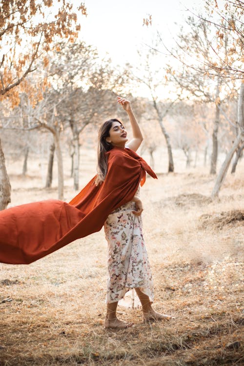 Beautiful Woman wearing Red Cape 