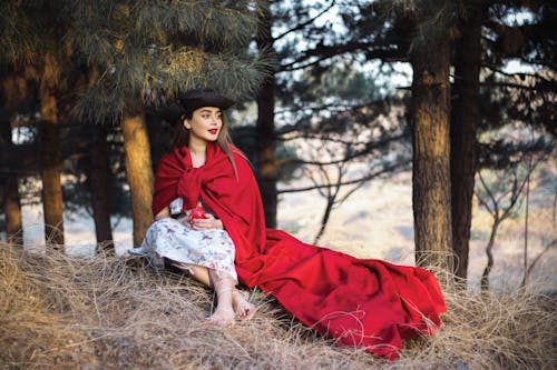 Beautiful Woman wearing Red Cape