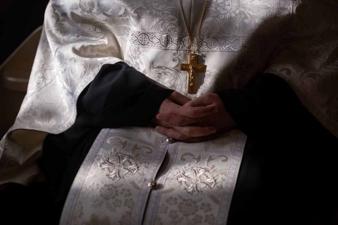 Close-up Photo of Priest's Hands · Free Stock Photo