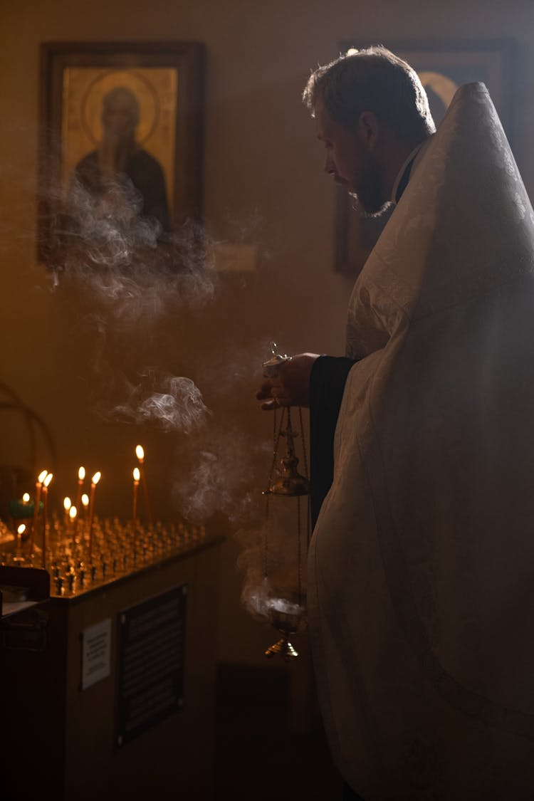 Orthodox Priest With Incense