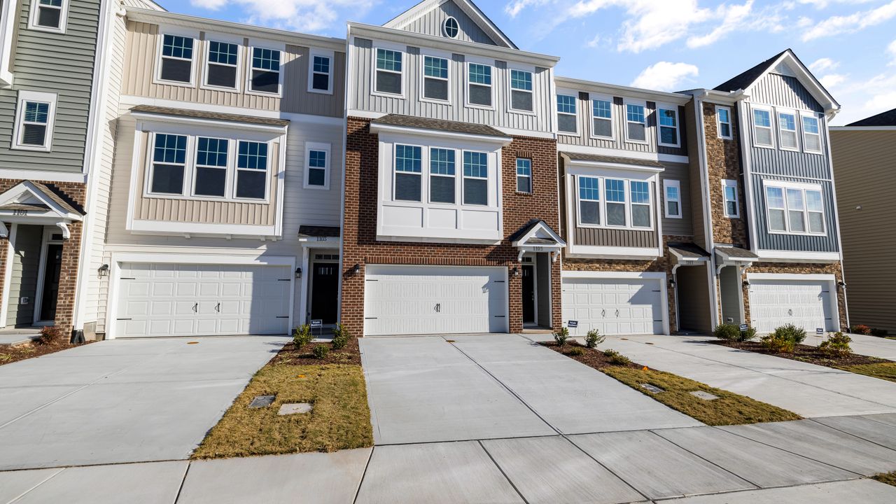 Comparing affordable homeownership costs Row of townhomes used to compare purchase price taxes insurance and commuting costs