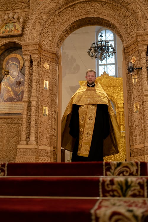 Priest standing in an Altar 