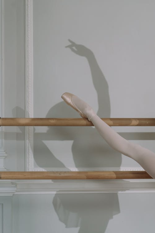 Shadow of a Ballerina Dancer in a White Wall · Free Stock Photo