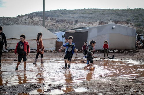 Kids Playing in Mud