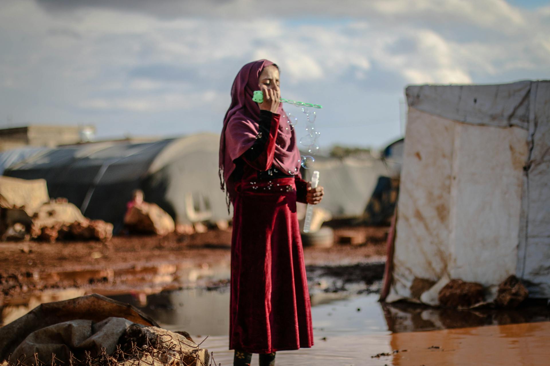 Young Girl playing Air Bubbles