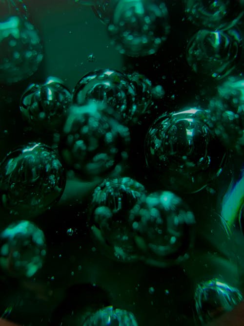 Close-up Photo of Green Bubbles