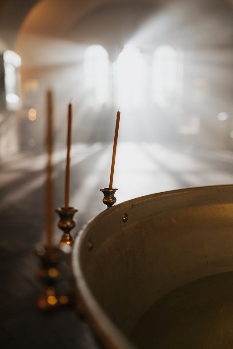 Candles Near The Baptismal Font