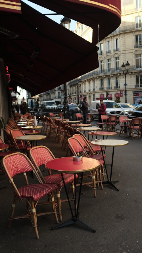 Free Chairs and Tables in front of a Restaurant  Stock Photo