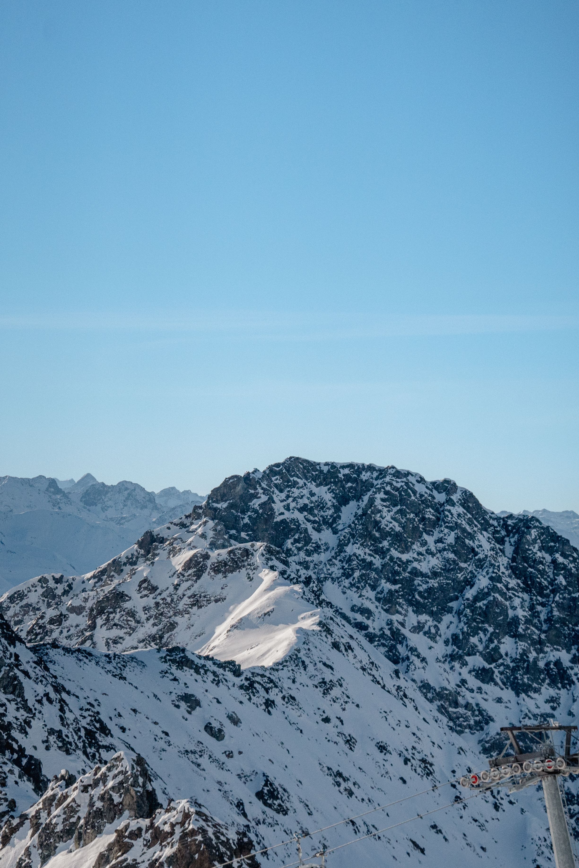 Snow Covered Mountains Under Blue Sky · Free Stock Photo